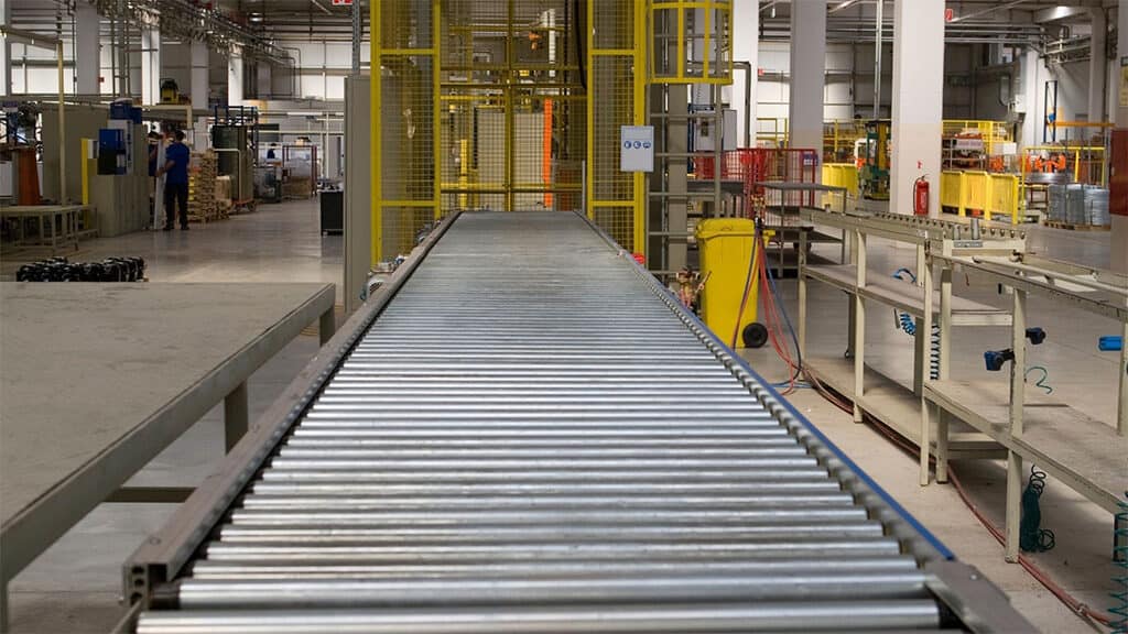 empty conveyor belt within a manufacturing plant