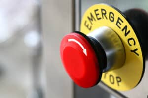 close-up image or an emergency stop button on machinery